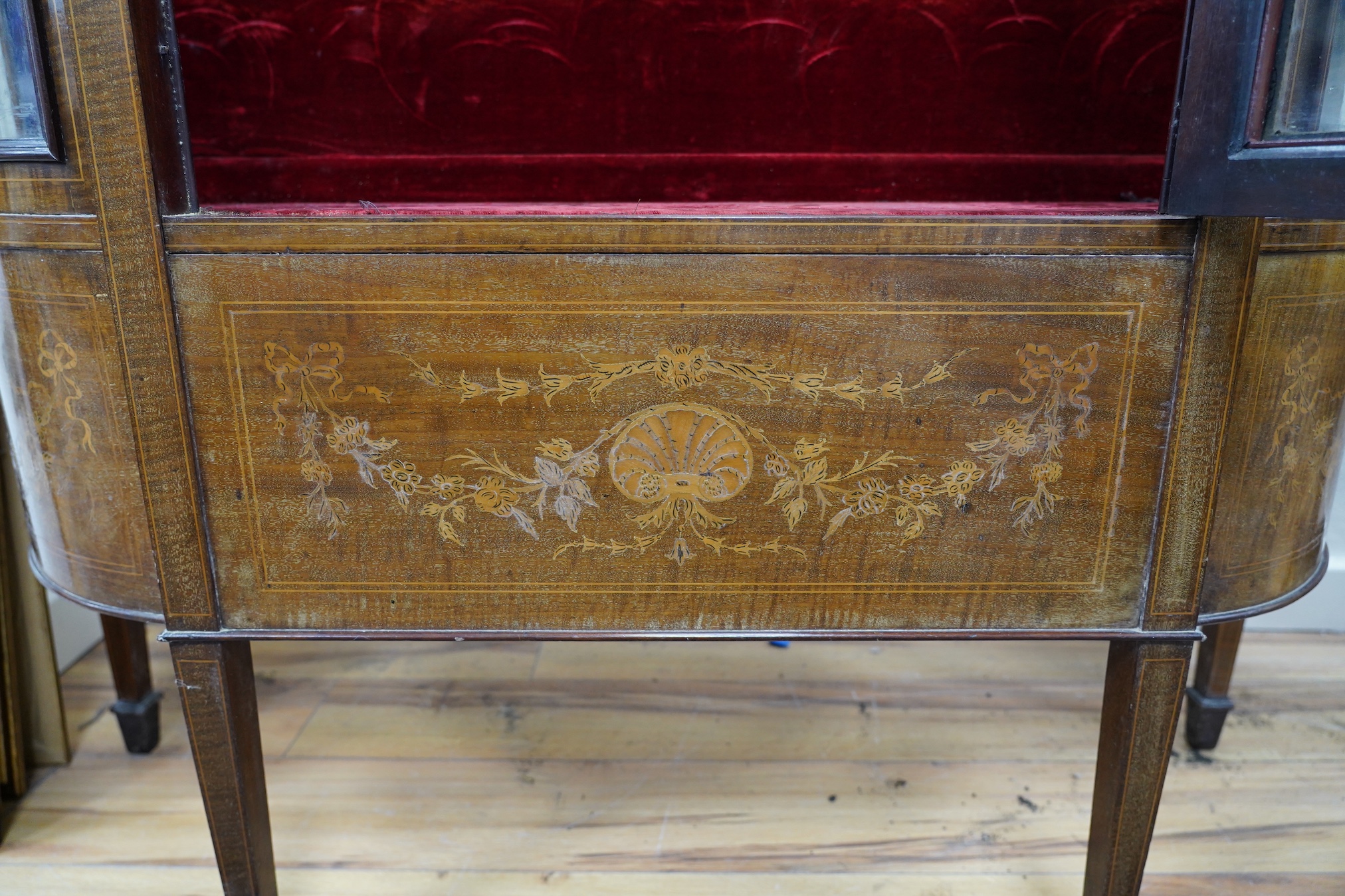 An Edwardian inlaid mahogany display cabinet, width 120cm, depth 39cm, height 169cm. Condition - fair